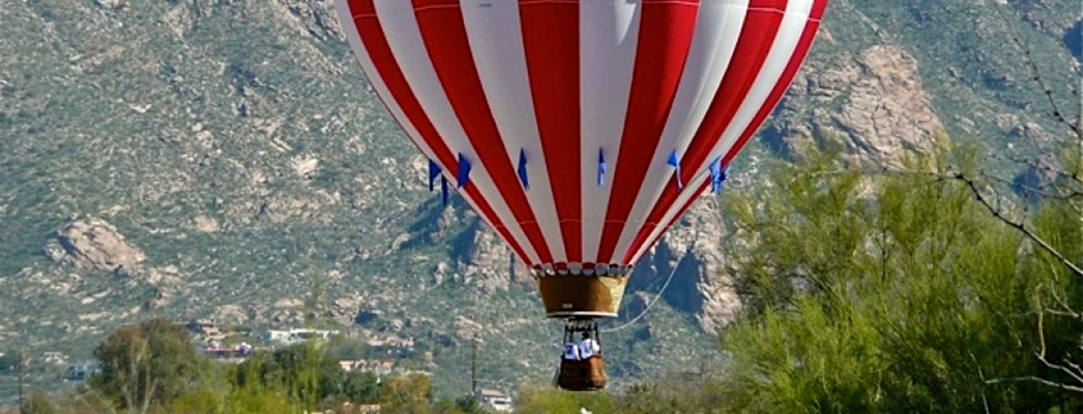 http://www.lasalturastucson.com/images/slides/Balloon_over_Las_Alturas_Slater.jpg